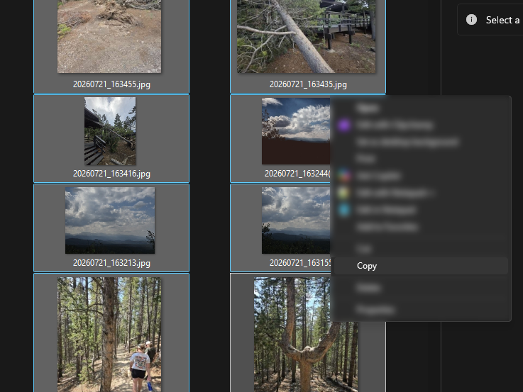 Trip photos selected in the Camera folder with the right-click menu open on Copy