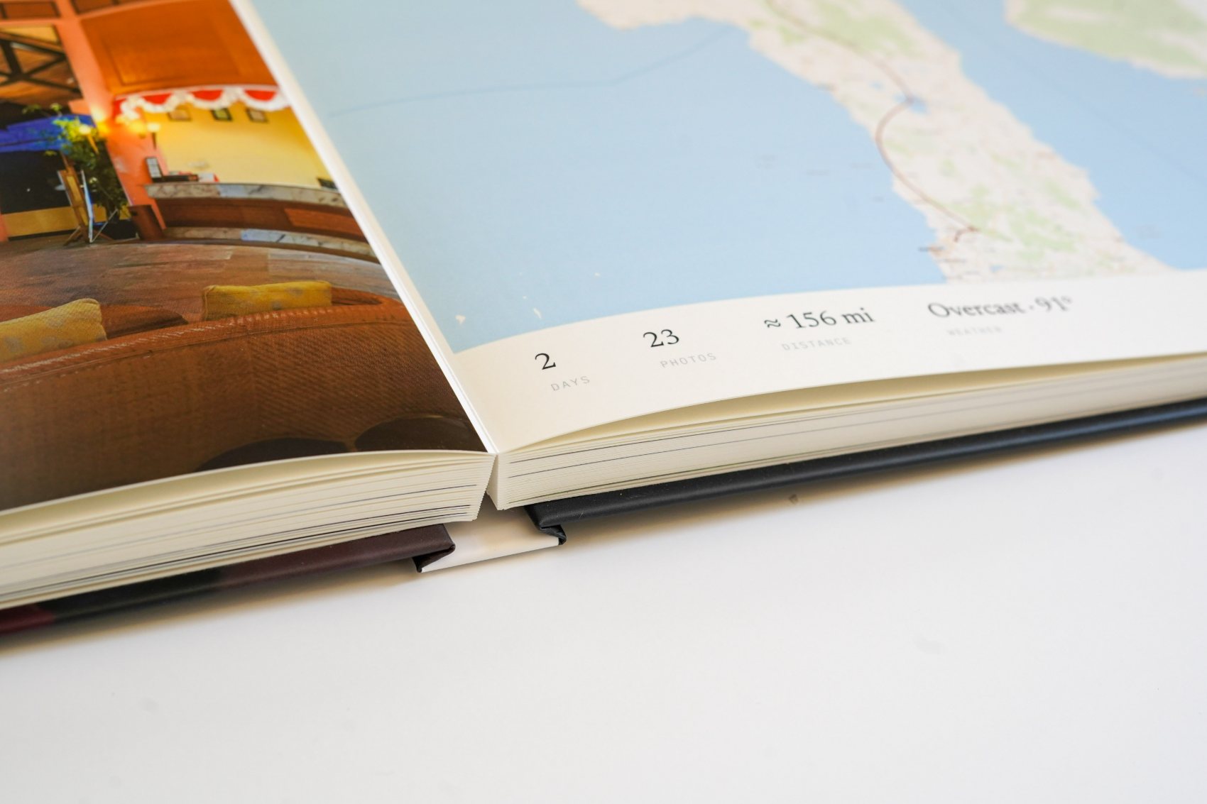 A lay-flat book open, the pages meeting almost flat at the binding