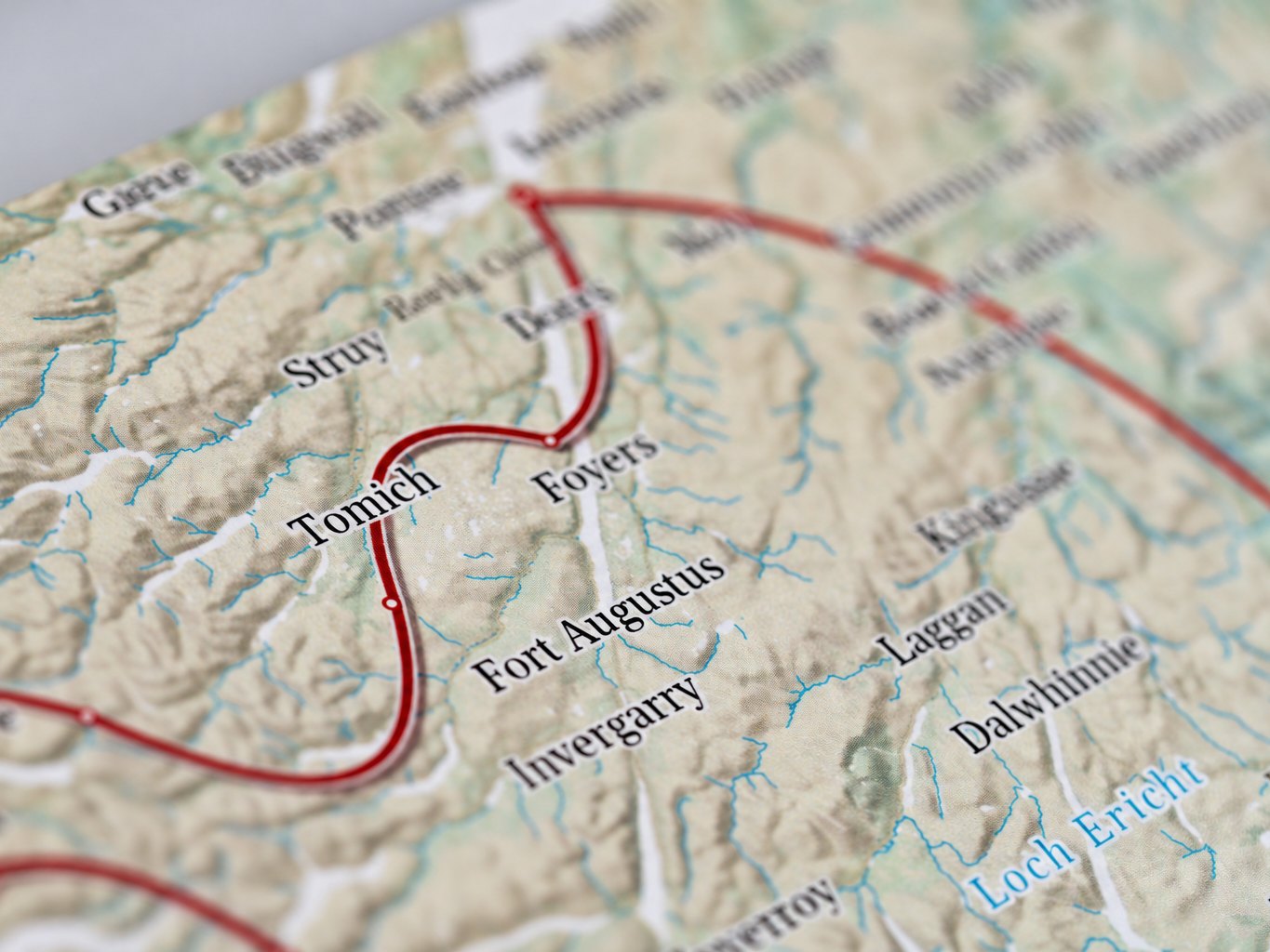 A printed map page up close: hill shading, Fort Augustus and Foyers, and the route drawn in red