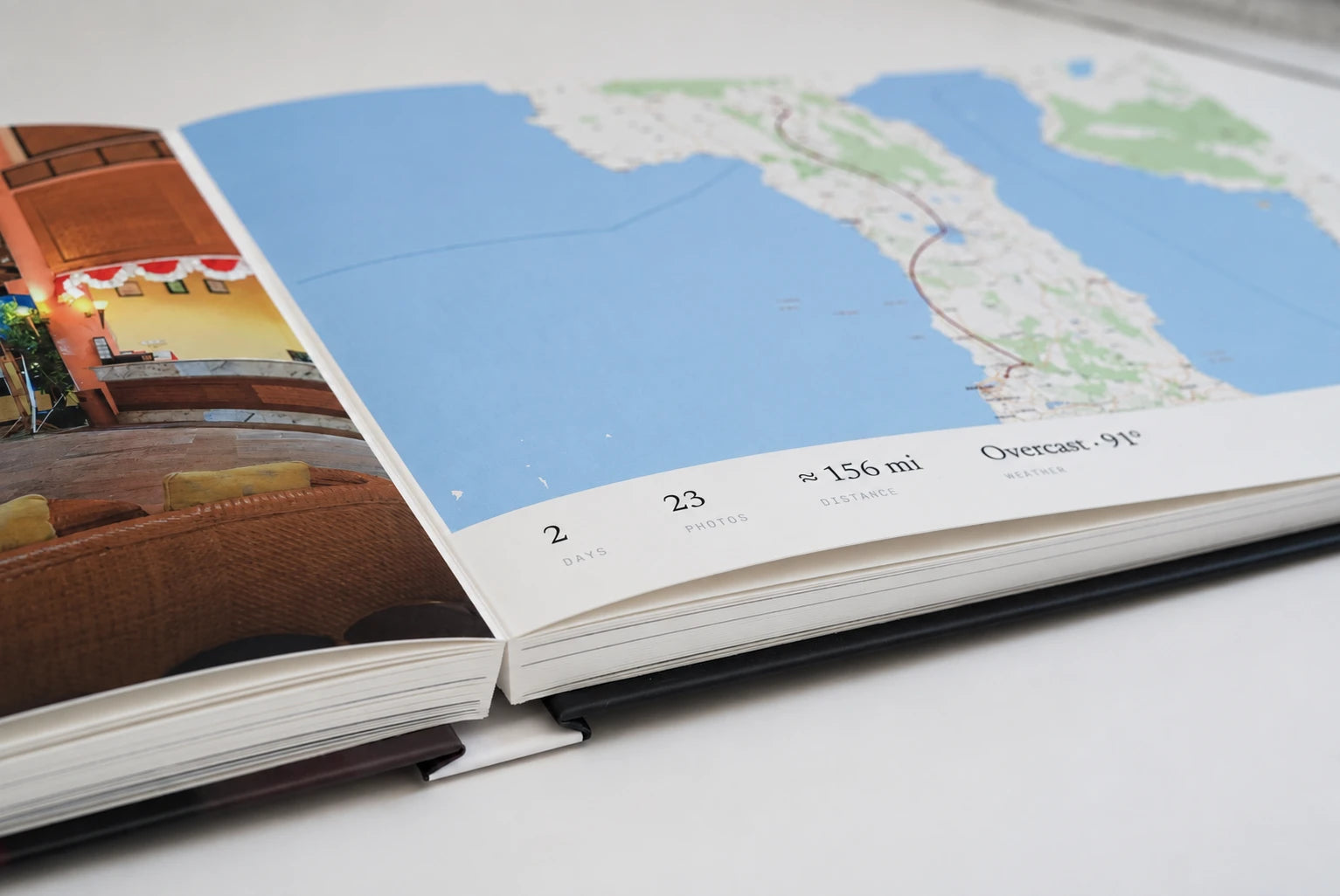 A chapter's opening spread: a photo on the left, the chapter's route on a map on the right with its days, photos, miles and weather