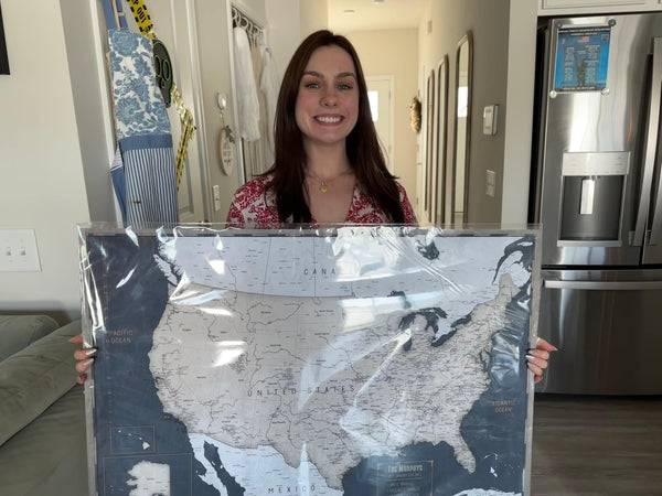 Customer push-pin map on a wall