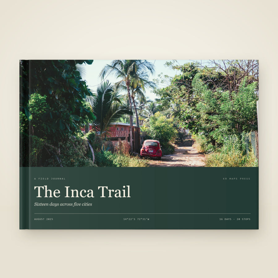 A A4 landscape hardcover KR Maps Travel Book, closed on a table — a book of the Inca Trail, the title set over one of the trip's own photographs