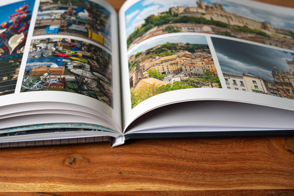 Open at the middle and lying flat &mdash; which is what it takes to read a map across the gutter