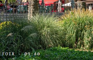 A printed page, close on a bandstand and terraces in Foix, stamped FOIX &middot; 09:40