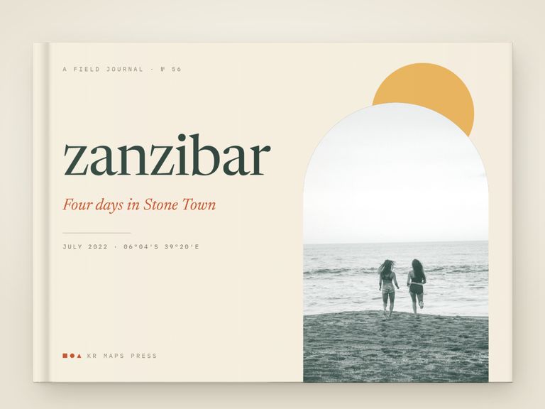 Cut paper &mdash; an A4 landscape Travel Book front cover, a real render from a lifestyle photograph