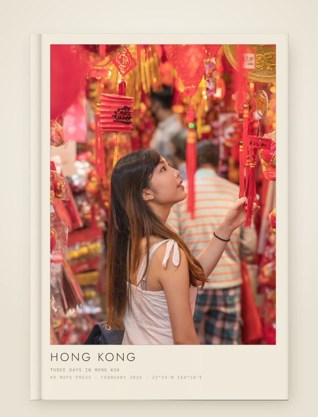 Gallery mount &mdash; an A4 portrait Travel Book front cover, a real render from a lifestyle photograph