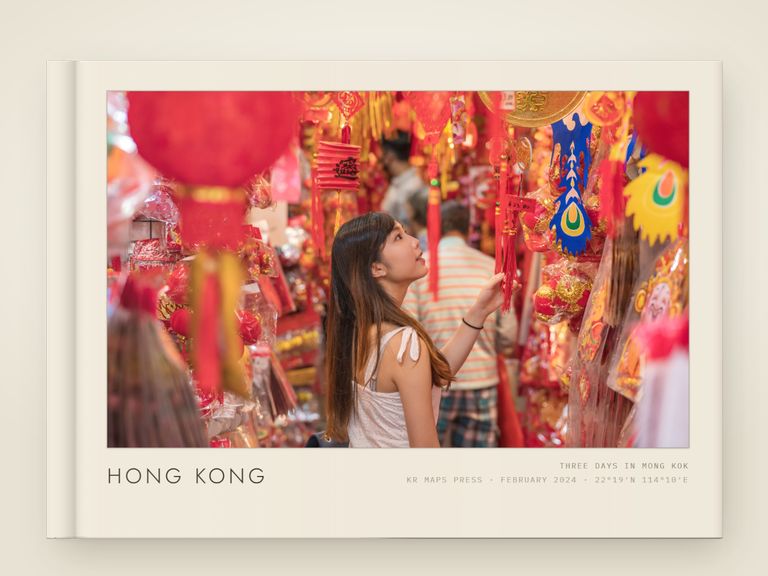 Gallery mount &mdash; an A5 landscape Travel Book front cover, a real render from a lifestyle photograph